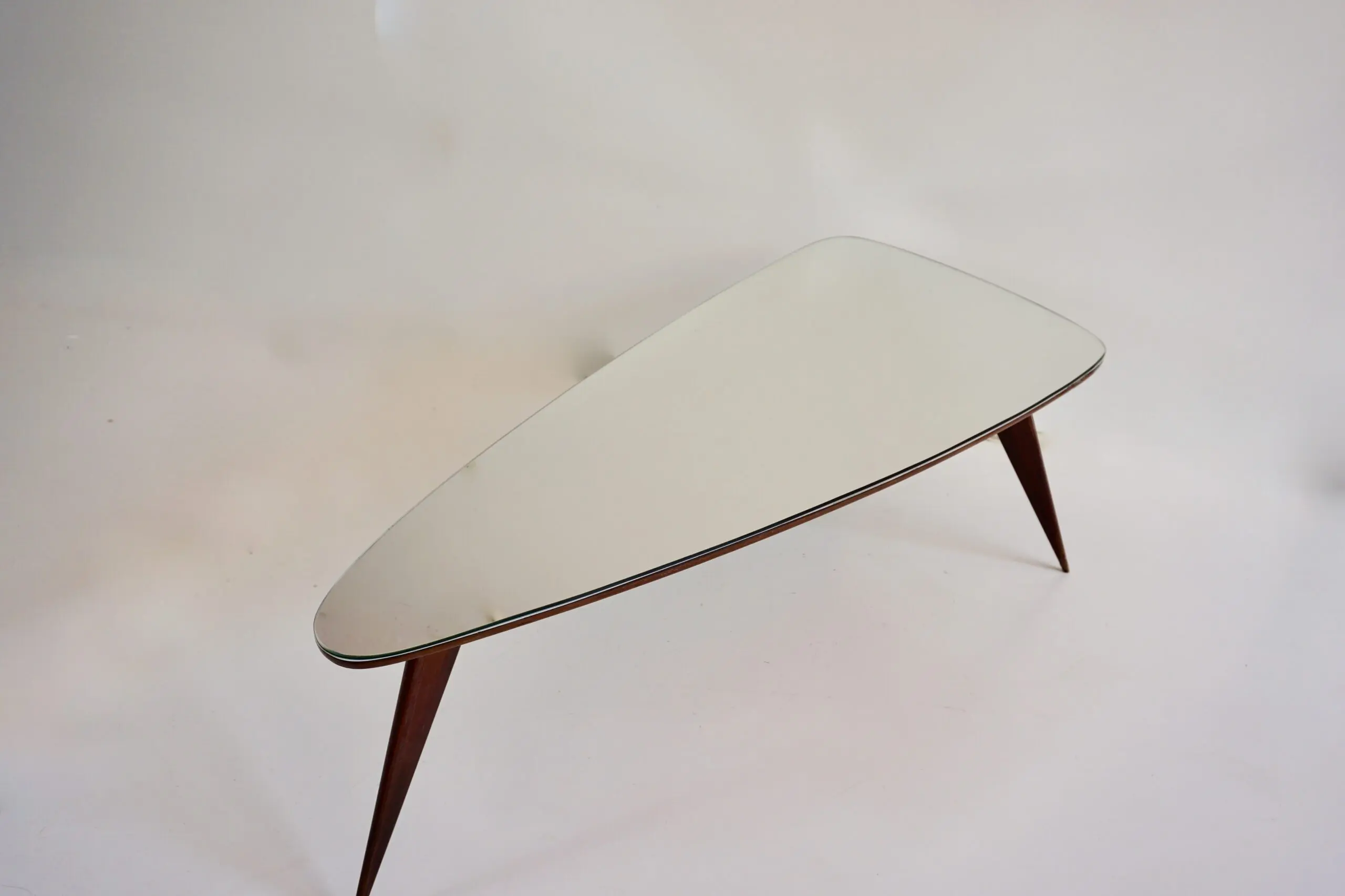 large Cesare Lacca walnut coffee table, three feet irregular shape, mirrored top — photo 7