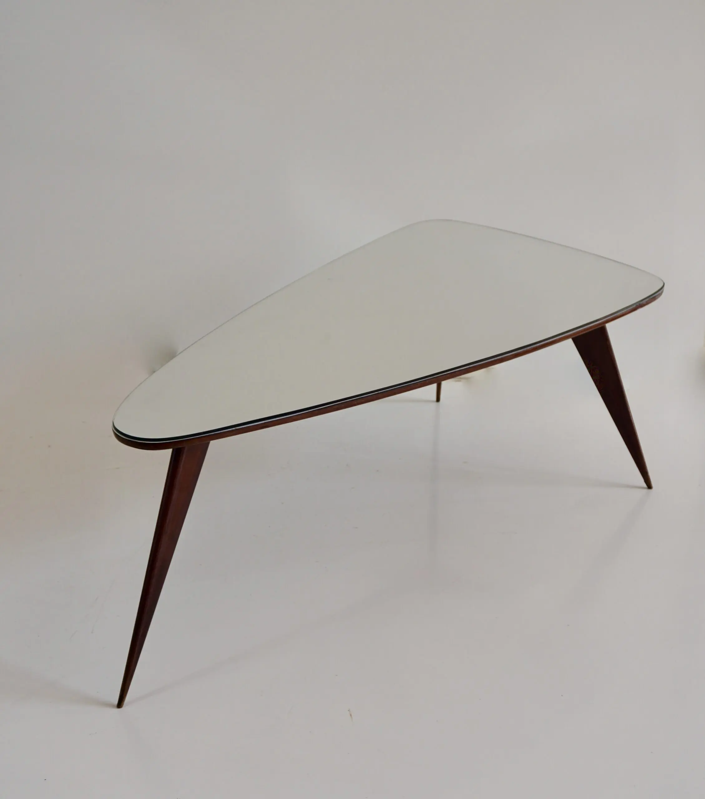 large Cesare Lacca walnut coffee table, three feet irregular shape, mirrored top — image 3