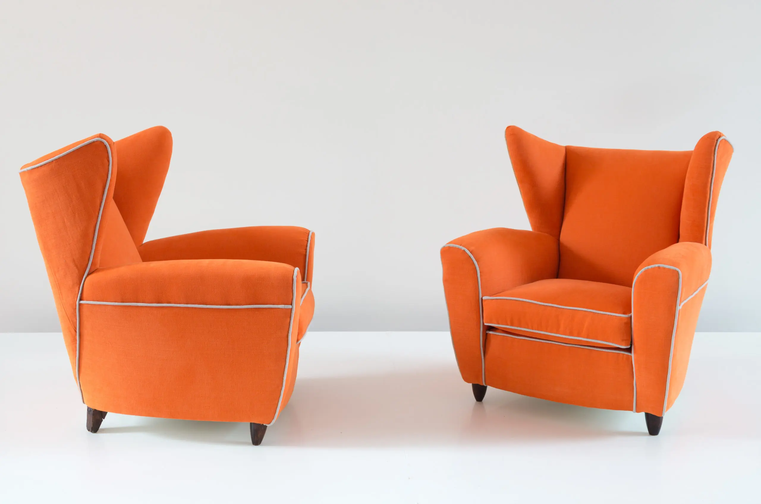 Pair of orange large wingback armchairs,att. to Melchiorre Bega, 1952 — image 3